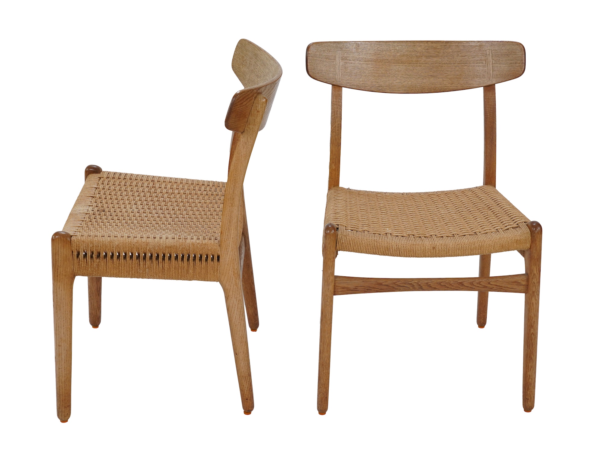 Hans Jørgensen Wegner (Danish, 1914-2007) for Carl Hansen & Søn Møbelfabrik : Two oak 'CH23' dining chairs